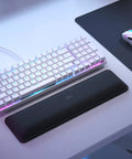 Full Size Prebuilt Mechanical Gaming Keyboard Featuring Compact 96 Layout In Crisp White Design With Silky Smooth Linear Switches Durable Abs Keycaps Reliable Double Shot Legends And Stunning Per Key Rgb Backlighting For A Dope Home Or Office Setup on a desk with a black mouse pad and gaming mouse.