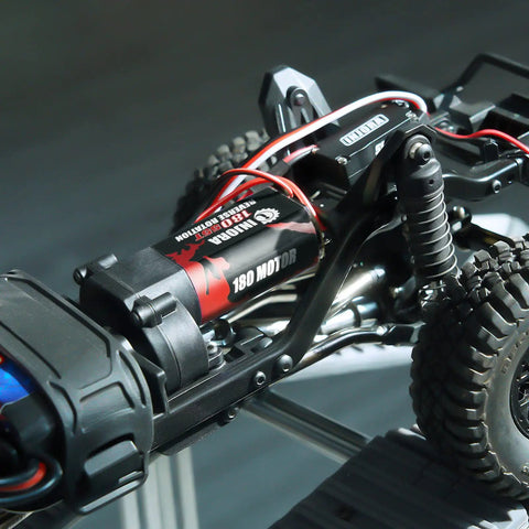 Close-up of 180 Brushed 55T RC Motor With Stainless Steel Pinion for TRX4M Crawler Upgrades Defenders Bronco K10 F150, installed.