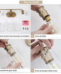 Installation steps for Three Light Gold Vanity Light With Seeded Glass Shades, showing parts, bulb screwing, and glass assembly.