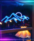 Sunrise Mountain Neon Light Sign USB Powered LED Wall Decor With Moon And Peaks glowing in a dimly lit room