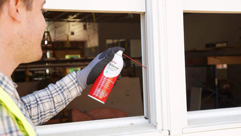Person using Silicone Lubricant With Teflon Fluoro Polymer For Non Metal Materials on window slider, water resistant and protective.