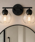 Two Light Black Bathroom Vanity Light Over Mirror With Clear Glass Globe Shades Dope Sleek Modern Bath Fixture