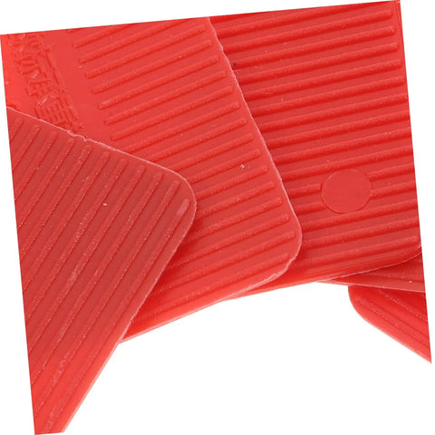 Close-up of red plastic shims from 100 Pcs Plastic Door Frame Shims For Windows And Doors, Load Bearing Leveling Wedges With Easy Install