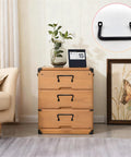 Image of wooden chest with set of 4 black tableware tray handles and serving tray pulls shown on drawer in living room.