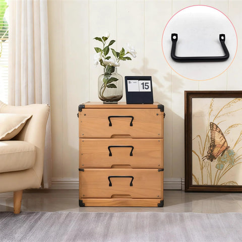 Image of wooden chest with set of 4 black tableware tray handles and serving tray pulls shown on drawer in living room.