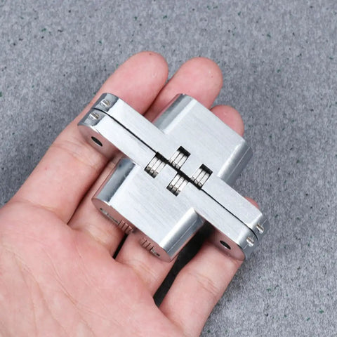 Concealed Cross Hinge Set Heavy Duty Stainless Steel 2 Pack Folding Door Hinges in hand showing detail