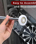 Close-up of hand holding 12 Pack 9 Inch Stem 2 Inch Modern White Nylon Garage Door Roller With 13 Ball Bearings against track