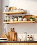 Rock Solid Hidden Floating Shelf Brackets Heavy Duty Black Metal L Bracket Wall Support in kitchen with jars and trays.