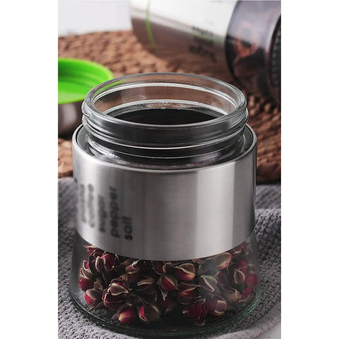 600 Milliliter Airtight Glass Coffee Storage Jar With Stainless Steel Lid Locks In Aroma For Beans Grounds Tea And Nuts with dried rose buds.