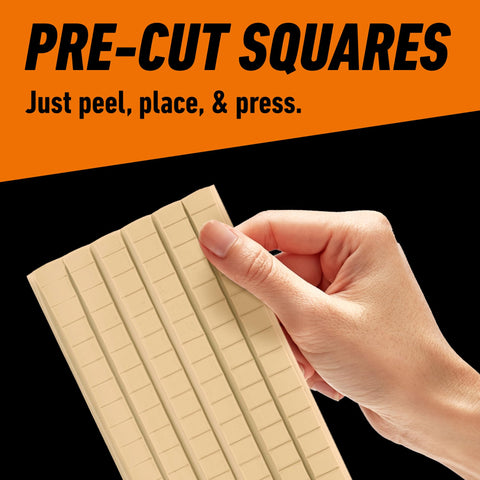 Hand holding Mounting Putty For Walls Natural Tan Color 168 Pre Cut Squares Removable And Repositionable Non Toxic Low Residue No Mess No Holes