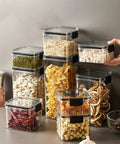 Straight Up Solid Game Changer For Your Kitchen Pantry Clear Airtight Glass Coffee Jar with various dry ingredients stored.