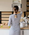 Person reaching into cabinet with Edge Pull Handles For Cabinets And Drawers, 3.15 Inch Aluminum Finger Edge Pulls In Black visible.