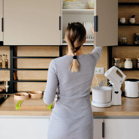 Person reaching into cabinet with Edge Pull Handles For Cabinets And Drawers, 3.15 Inch Aluminum Finger Edge Pulls In Black visible.