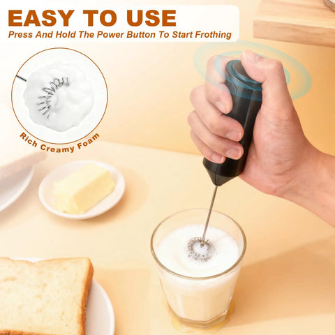 Handheld Milk Frother Battery Operated Electric Foam Maker Wand With Stainless Steel Whisk frothing milk in glass