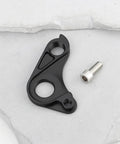 Direct Replacement Derailleur Hanger S206000001 For Specialized Aethos And Tarmac SL8 with screw on white surface