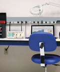 Heavy Duty 12 Outlet Surge Protector Power Strip With 15 Foot Cord, Metal Enclosure, 2400W 120V 20A on a workbench setup