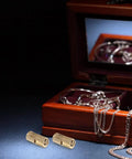8Pcs Solid Brass Hidden Hinges for jewelry boxes near an open wooden jewelry box with chains inside