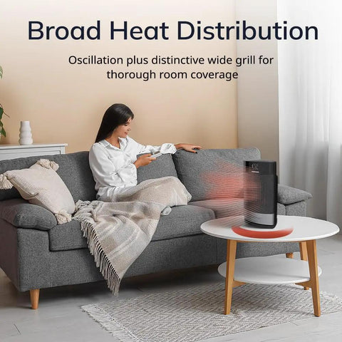 Ellipse Ceramic Tabletop Heater With Tip-Over Switch And Child Lock Digital Display Thermostat Auto Eco Mode Wide Oscillation Remote 1500W Black in a cozy living room setting, placed on a white coffee table, radiating warmth.