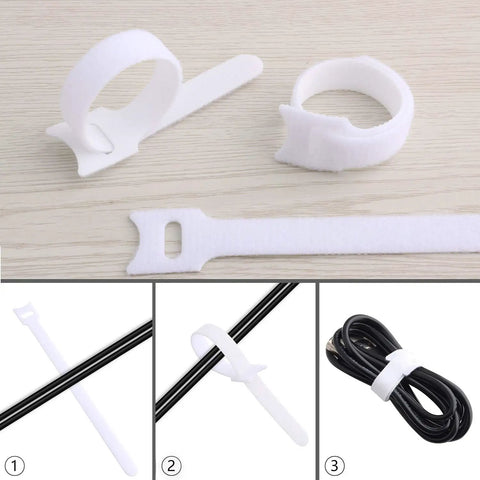 White reusable fabric ties from 60 Pack Hook And Loop Cable Ties 6 7 8 Inch for cable management and organization.