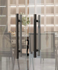 36-Inch Stainless Steel Push Pull Door Handle Black H Shape For Sliding Barn Doors And Commercial Heavy Duty Glass Showers SUS304 With Upgraded Three Pillar Mount displayed on a glass shower door
