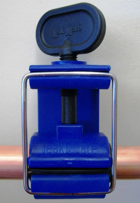 Emergency Pipe Repair Tool That Stops Leaks Fast In Seconds clamped on 15 mm copper pipe, reusable leak sealer, portable