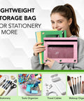 Person holding 3-ring binders and a pink heavy duty canvas pencil pouch with dual zipper and clear window for organization.