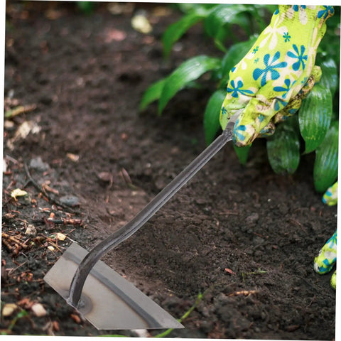 Gardener using 4-Piece Garden Hoe Set For Weeding And Soil Loosening with wear-resistant blade in flower bed
