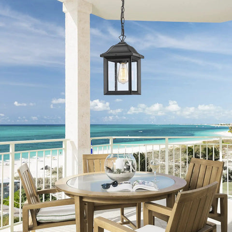 Rugged Outdoor Porch Chandelier With Seeded Glass Hanging Lantern In Sand Black Aluminum Finish on beachside porch