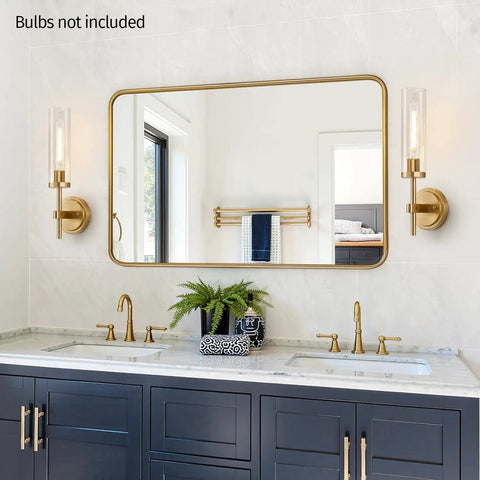 Modern Brushed Gold Wall Sconces Set Of Two With Clear Glass Hardwired Adjustable Up Or Down Vanity Light Fixture For Bathroom Smooth Vibe Upgrade in stylish bathroom setting.