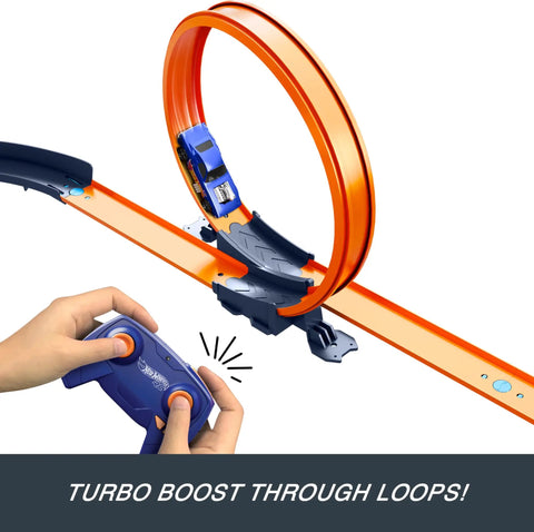 Hot Wheels RC Speed Challenge Track Set With 1 to 64 scale remote control car performing a loop on orange track