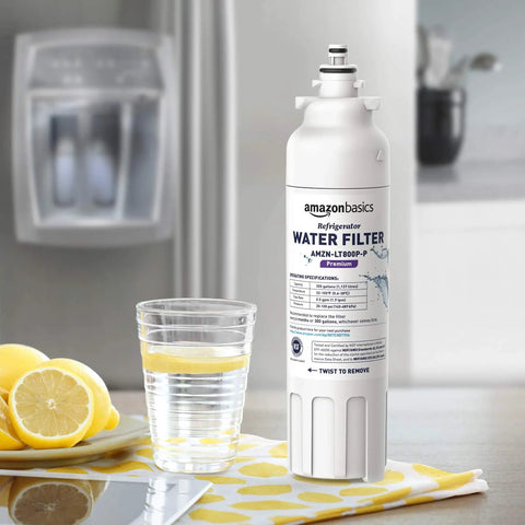 LG LT800P Refrigerator Water Filter Cartridge Replacement next to glass of water and lemons in kitchen setting