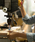 Heavy Duty Tungsten Carbide Forstner Bit crushes through hardwood on a bench drill for smooth one inch bore holes.