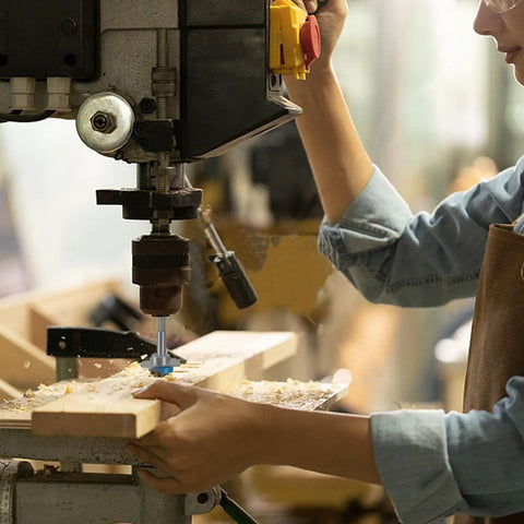 Heavy Duty Tungsten Carbide Forstner Bit crushes through hardwood on a bench drill for smooth one inch bore holes.