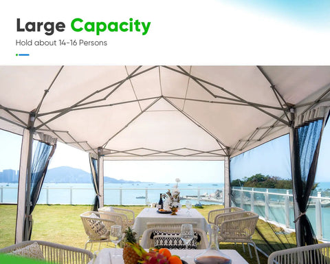 Interior view of 10x20 Pop Up Screened Canopy Tent With Mosquito Netting, set up for outdoor dining, overlooking a scenic view