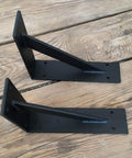 Rock Solid Floating Shelf Brackets Heavy Duty Tripod Wall Supports black iron brackets for shelving on wooden surface.
