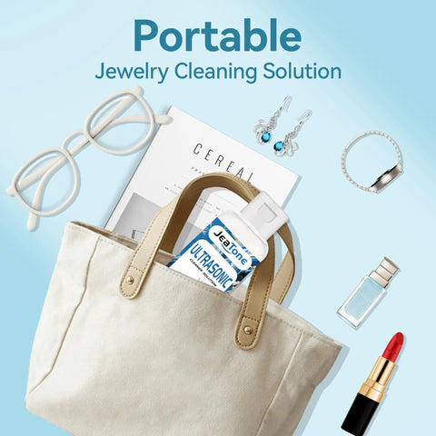 Portable Premium Ultrasonic Cleaner Juice For Bling Glasses And Sensitive Finds Wakes Up Muted Gems in a cloth bag.