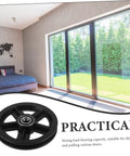 A Pair Of Heavy Duty Replacement Pulley Wheels For Sliding Barn Doors And Metal Gates Built For Roll Like Butter Performance With Sealed Bearings And Zero Hassle Everyday Reliability shown in an interior setting.