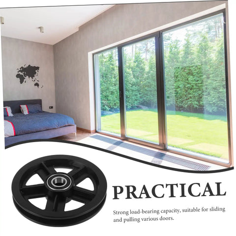 A Pair Of Heavy Duty Replacement Pulley Wheels For Sliding Barn Doors And Metal Gates Built For Roll Like Butter Performance With Sealed Bearings And Zero Hassle Everyday Reliability shown in an interior setting.