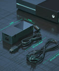 Xbox One Power Supply Adapter Replacement Brick 100 240V Global Voltage Compatible With Xbox One And Xbox 360 DC 22V Output Quiet Durable With Efficient Cooling Fan For Smooth Gaming Gamer Ready, black power brick with cords
