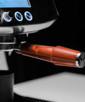 Level Up Your Home Barista Setup With This 58mm Bottomless Portafilter For Breville Dual Boiler Oracle Espresso Machine Rosewood Handle close-up.