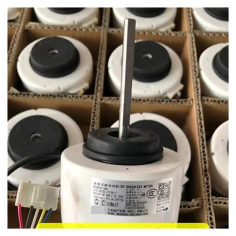 Close-up of a 310V DC Brushless Fan Motor For Air Conditioners WZDK58-38G 8-Pole 58W Replacement Part, shaft and label visible