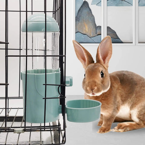 2 Pack No Drip Rabbit Water Bottle 17oz Hanging Automatic Dispenser with a rabbit next to a cage-mounted water bottle.