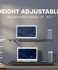 Budget Friendly 29 Inch Height Adjustable Standing Desk Converter for sit stand workstation with laptops, showing elevation at 16.2 inches.
