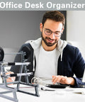 Smiling man at desk with squat rack pen holder for desk with barbell rack design gym themed office organizer mini weight rack pencil holder