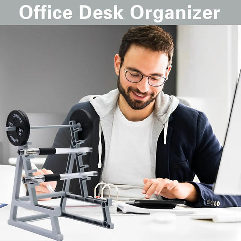 Smiling man at desk with squat rack pen holder for desk with barbell rack design gym themed office organizer mini weight rack pencil holder