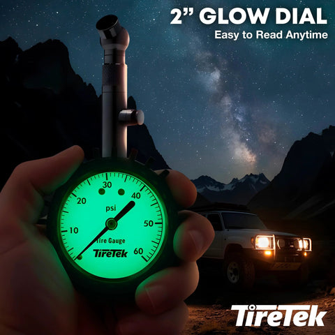 Tire pressure gauge with glowing green analog dial, front view; TireTek brand for cars.