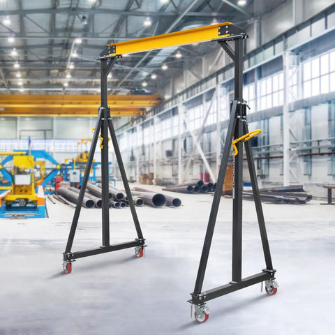 Heavy Duty Portable Gantry Crane 2 Ton 4400 Lb Load Capacity adjustable lift rig in industrial warehouse setting.