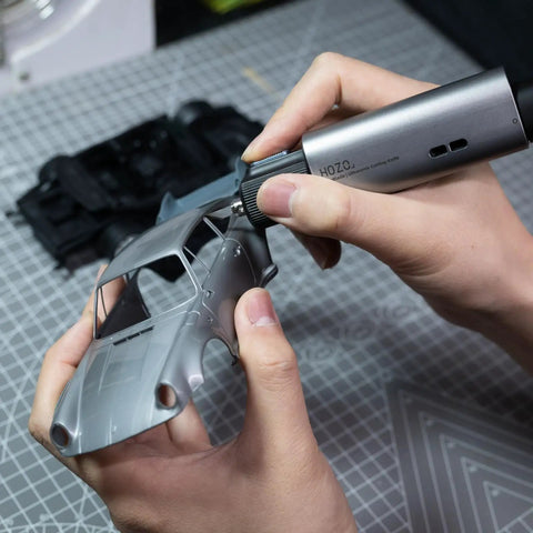 Using the Feather-Light Wireless On The Go Ultrasonic Cutter With 40kHz Vibration And 40W Auto Power on a model car
