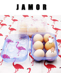 Six Grid Egg Storage Box For Refrigerator And Camping, blue container with six eggs on flamingo print tablecloth