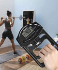 Digital Hand Dynamometer Grip Strength Meter With Auto Capture Electronic Hand Grip Power 198 Lbs 90 Kgs Black in a home gym setting